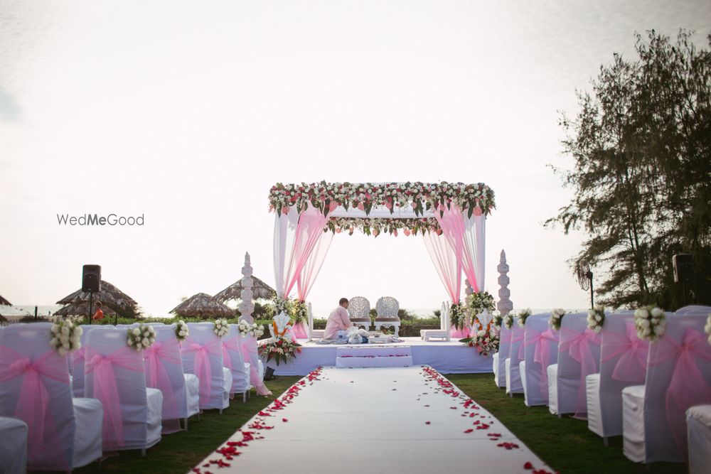 Photo of white and pink chairs