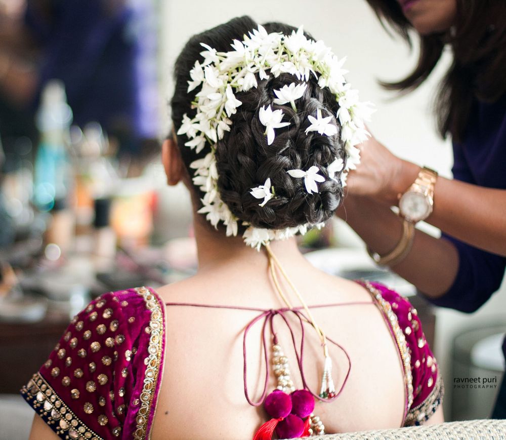 Photo of Bridal bun with white flowers and gajra