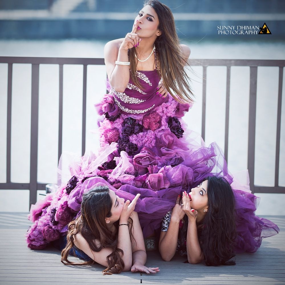 Photo of Fun filled bride with bridesmaids shot
