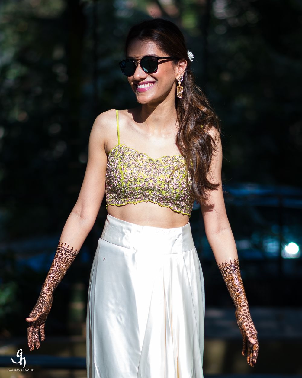 Photo of Unique mehendi outfit with lime green bralette and skirt