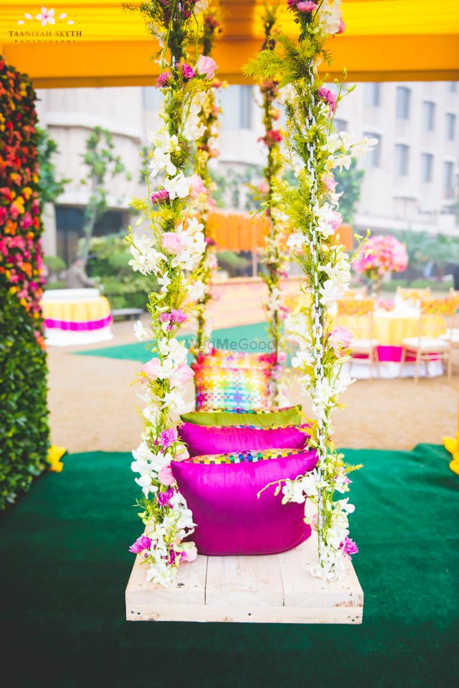 Photo of Floral mehendi swing for bride