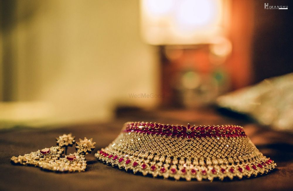 Photo of Bridal choker necklace and earrings with red stones
