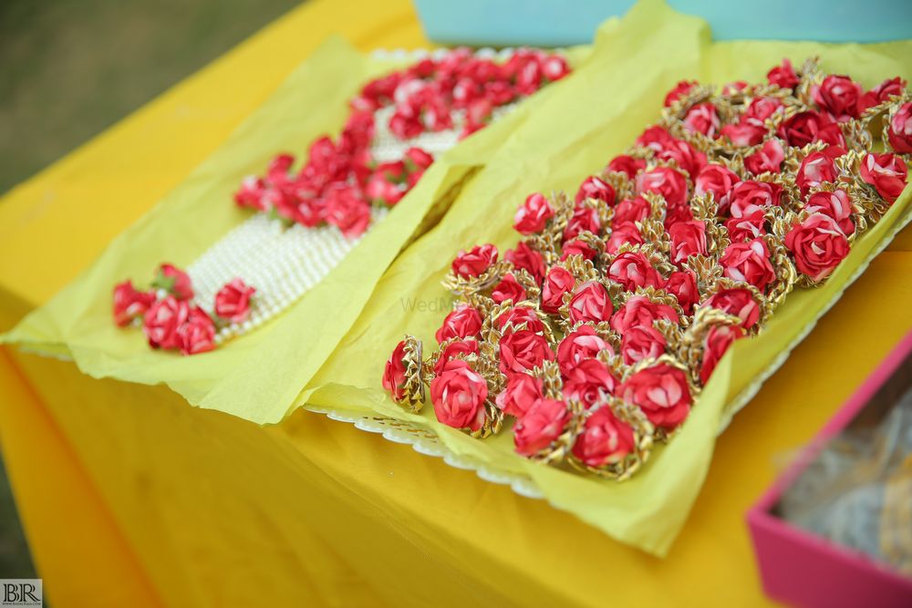Photo of Floral and gota jewellery favours for mehendi