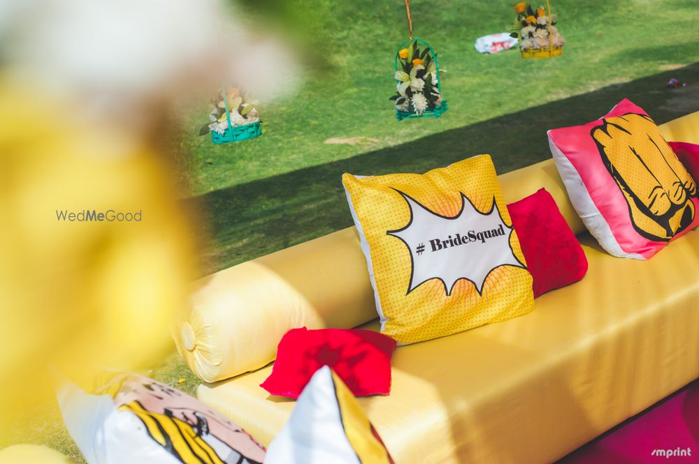 Photo of Mehendi decor idea with bride squad cushion