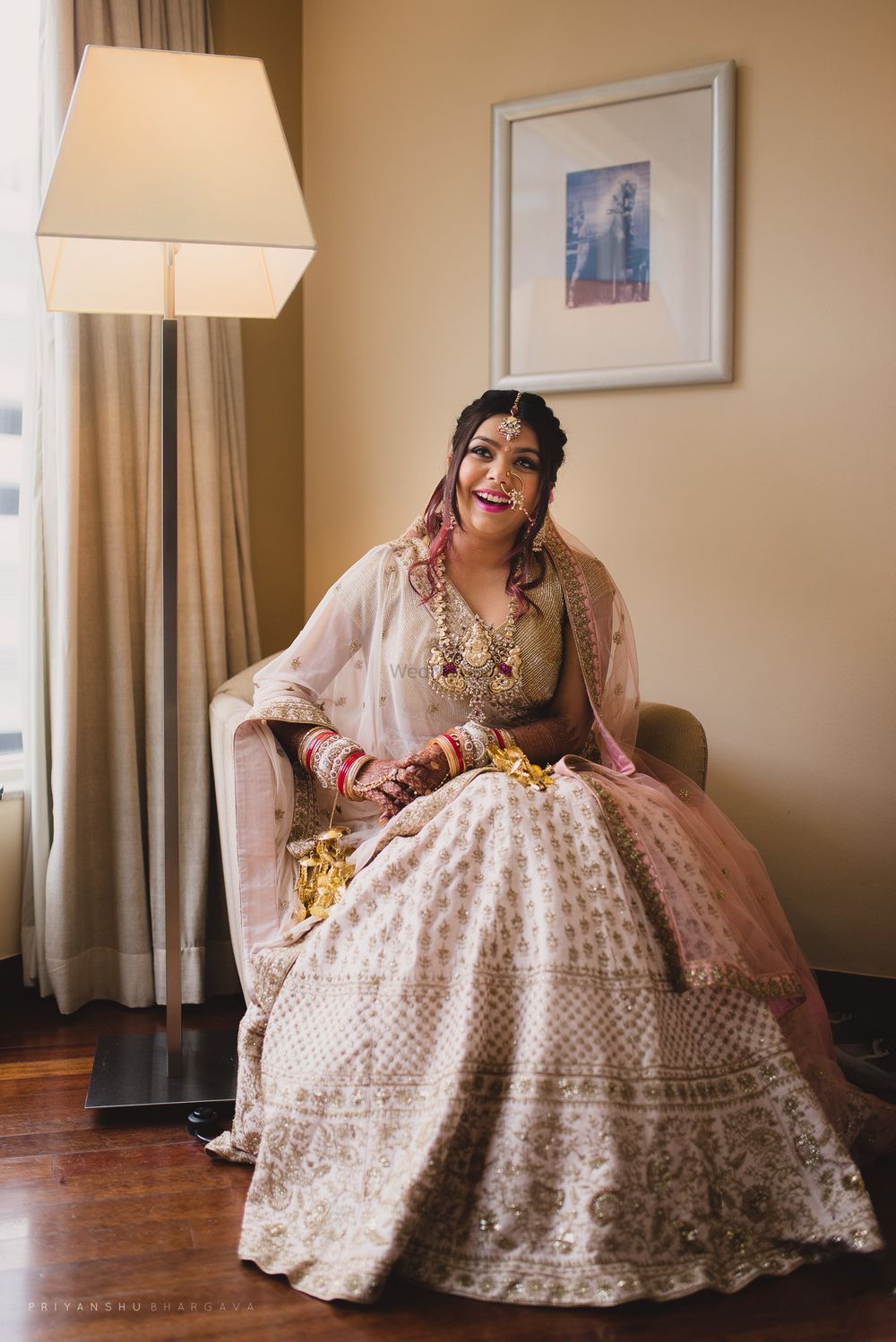 Photo of Blush pink and ivory bridal lehenga for morning bride