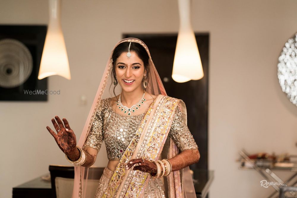 Photo of Peach and silver offbeat bridal lehenga