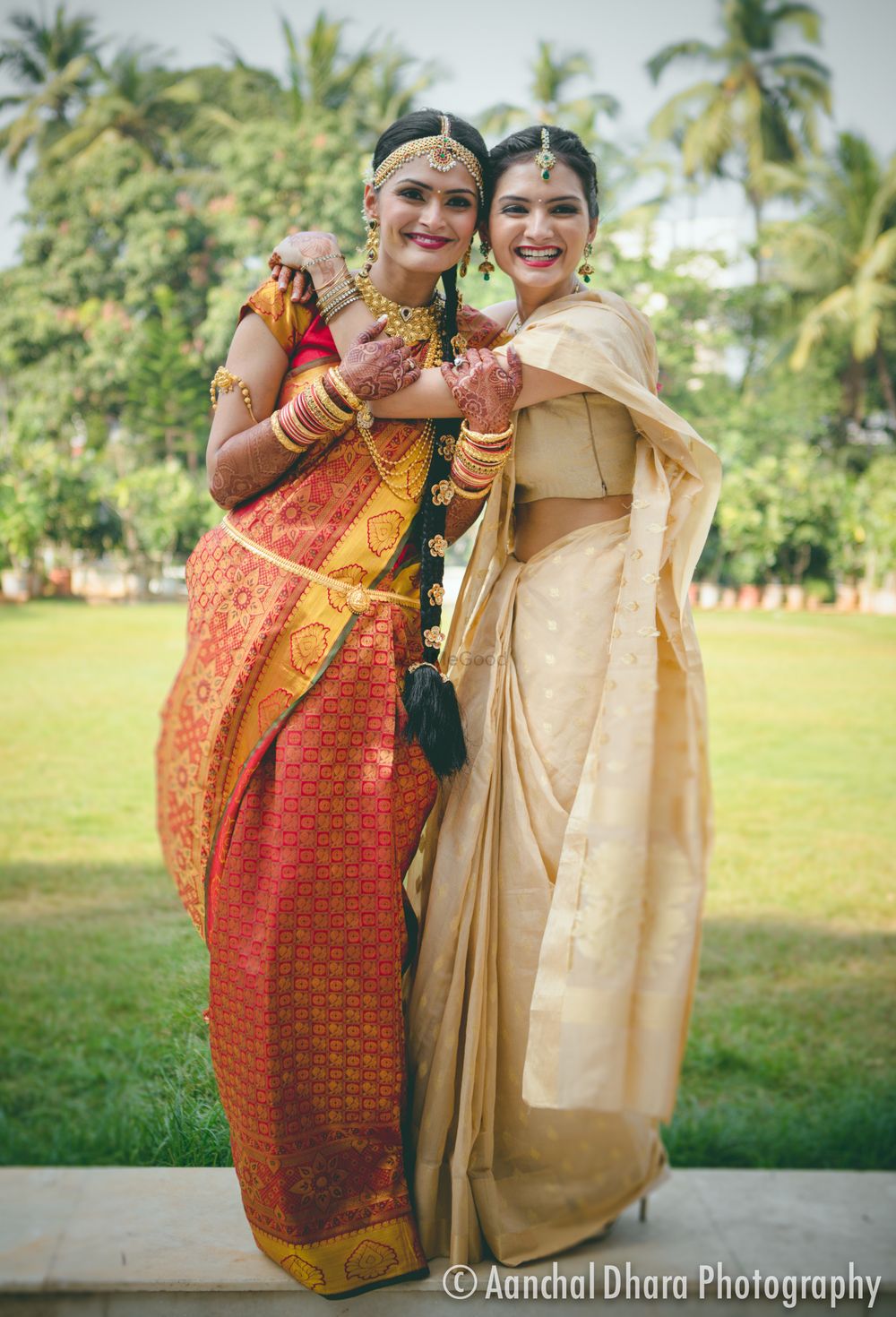 Photo of South Indian bride with sister in saree