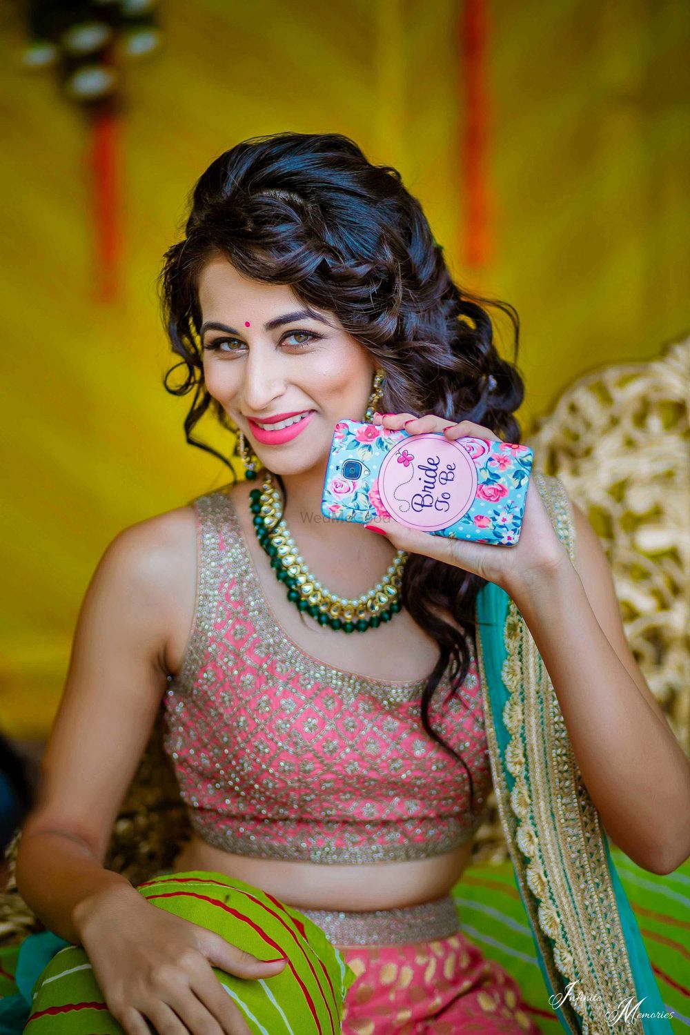 Photo of Bride showing off bride to be phone cover