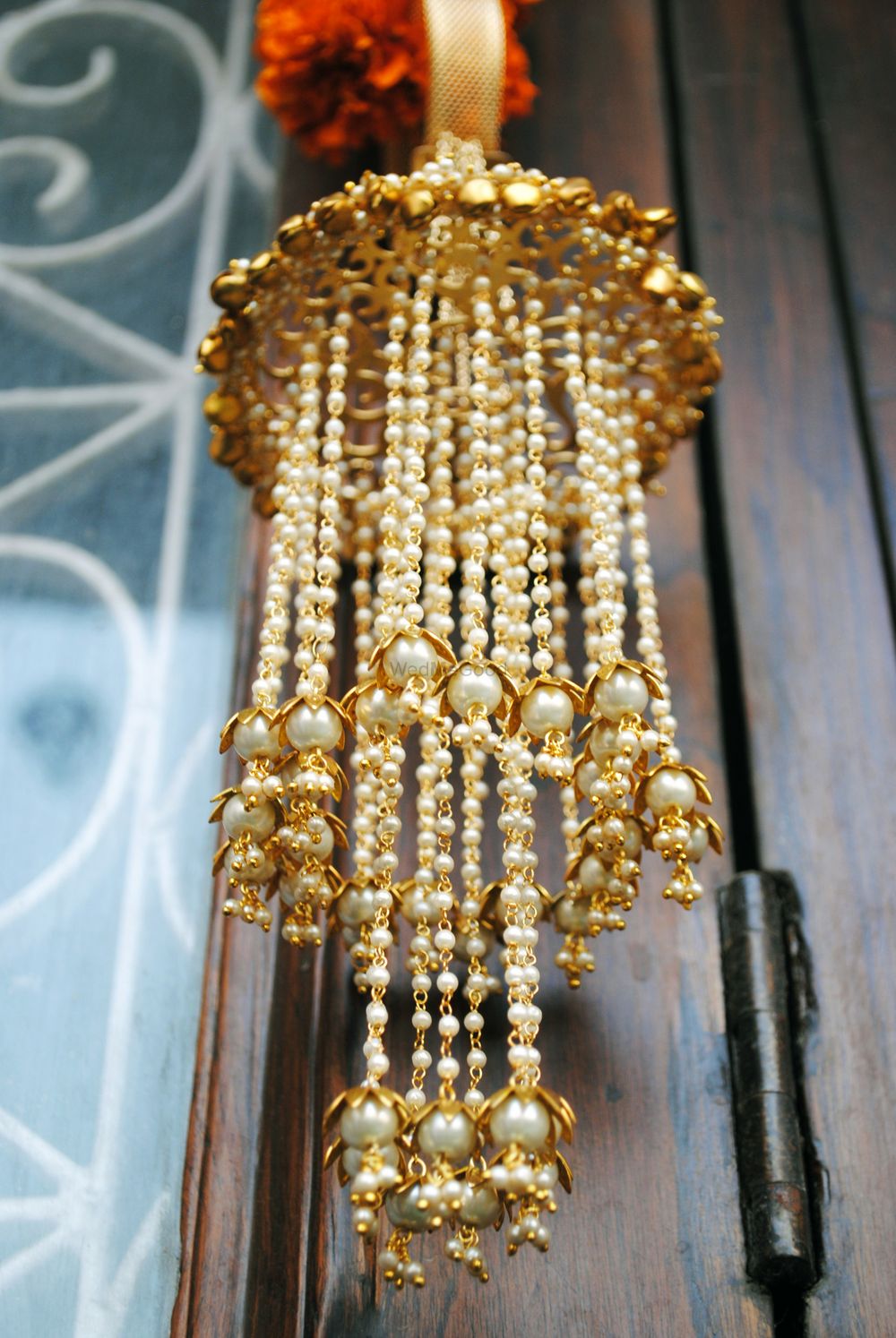 Photo of Gold and white kaleere with pearls