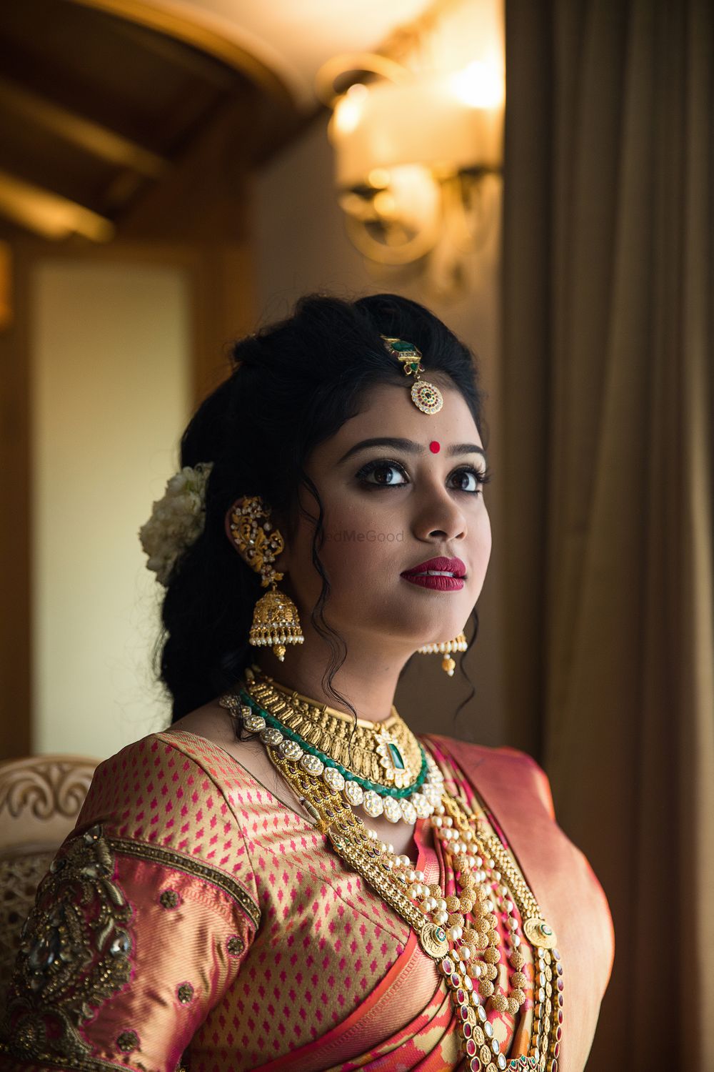 Photo of South Indian bride in red and gold look