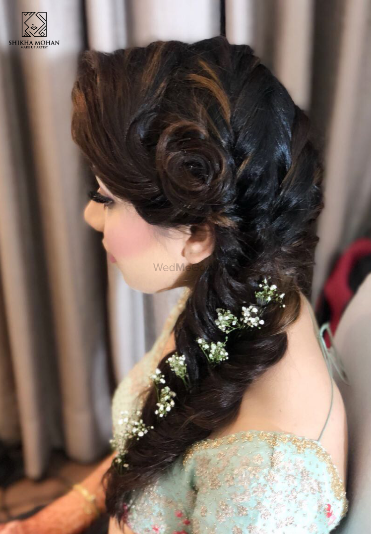 Photo of Intricate bridal braid for a mehendi or engagement function