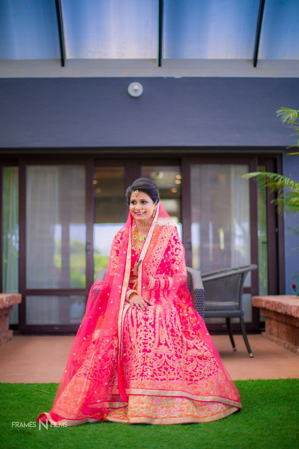 Photo of Bright pink and orange bridal lehenga with double dupatta