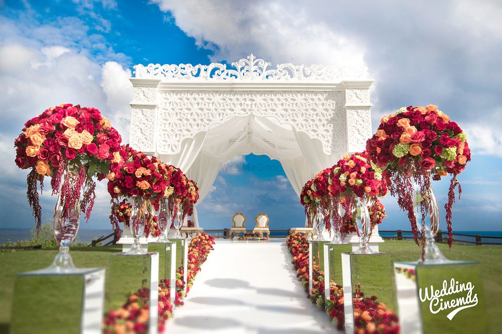 Photo of Destination wedding mandap with floral aisle