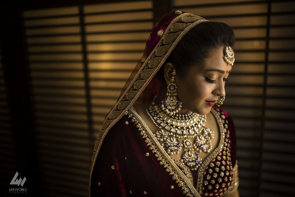 Photo of Shy bridal portrait with pretty jewellery