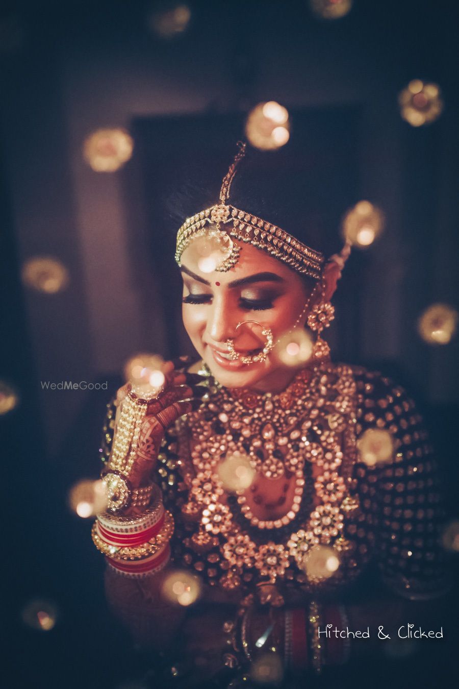 Photo of Pretty bridal portrait through dupatta