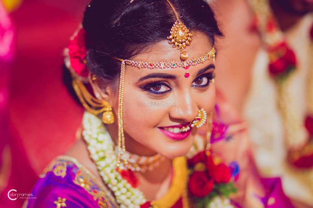 Photo of South Indian bridal look smokey eyes with pink lips