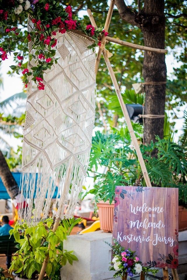 Photo of Mehendi entrance decor with crochet hanging