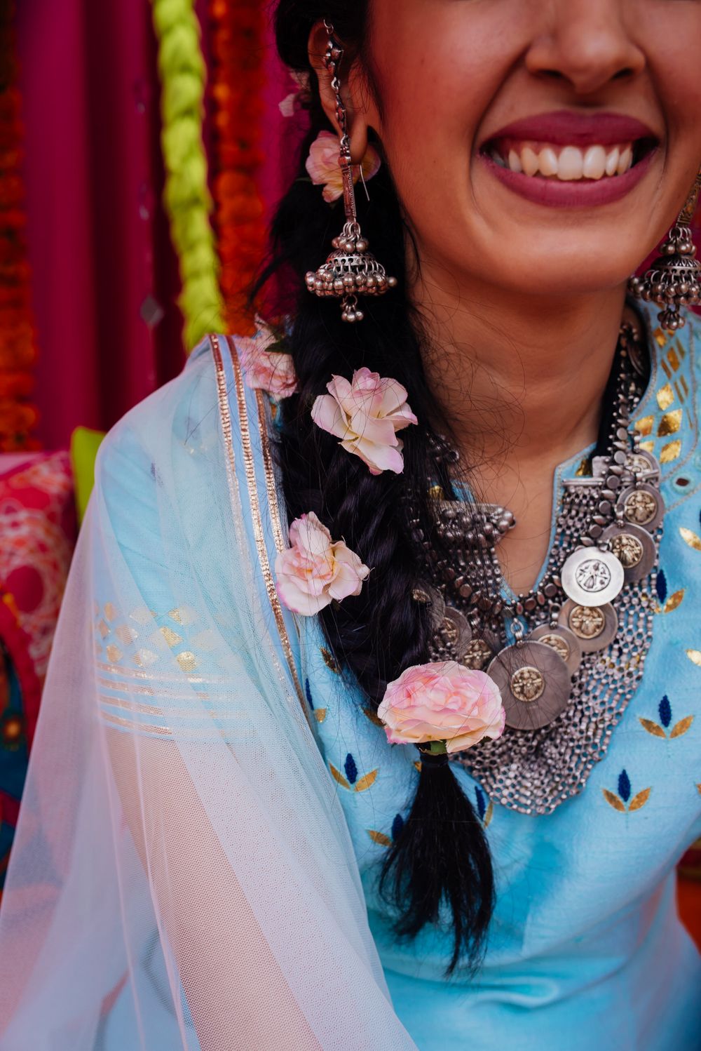 Photo of Mehendi side braid with big flowers