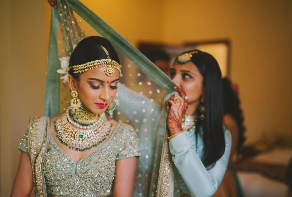 Photo of A bride in shimmer lehenga