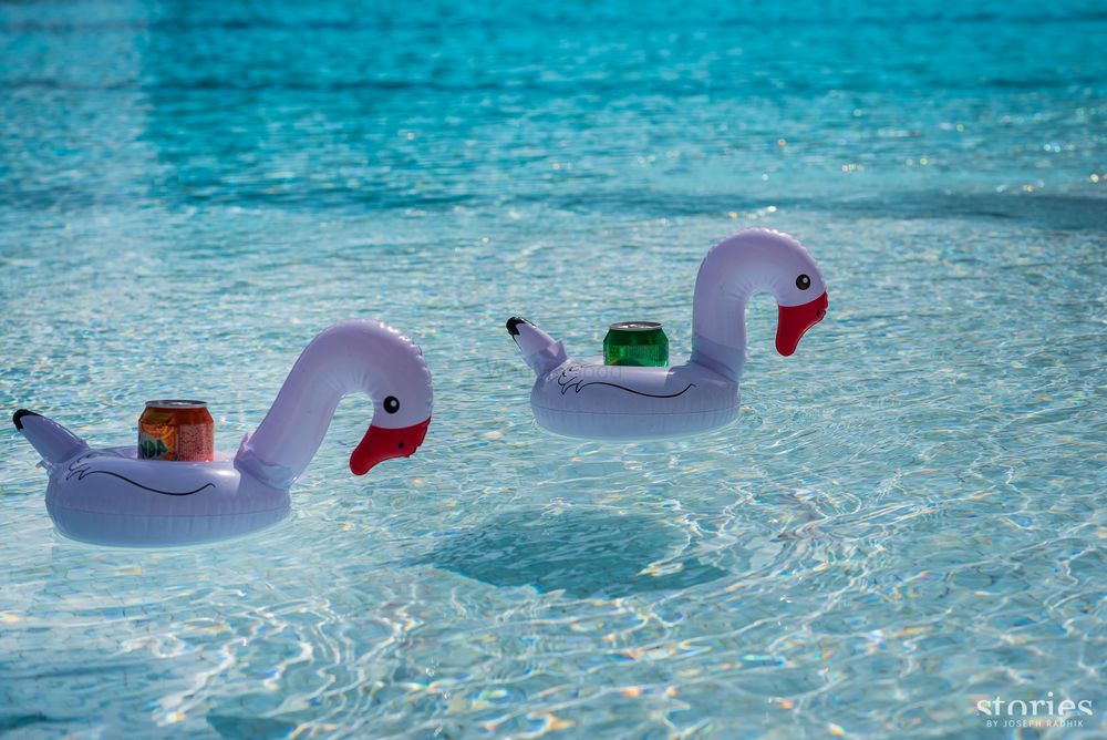 Photo of Cute and unique flamingo themed pool party drink floats