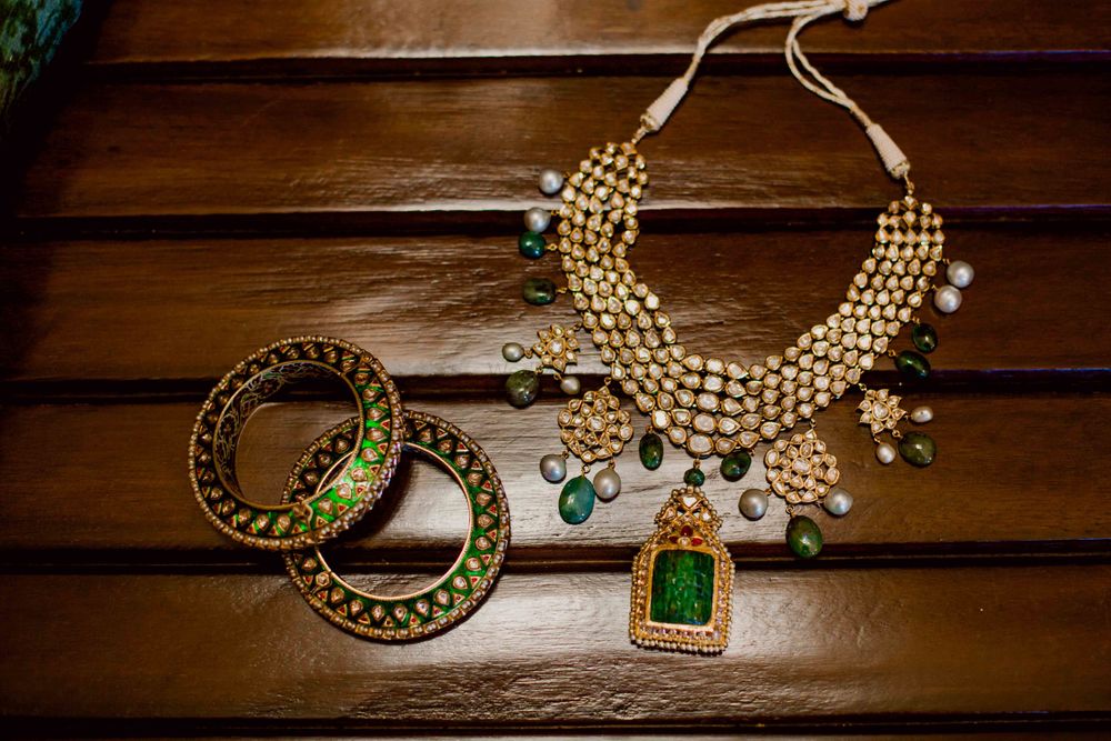 Photo of Unique bridal jewellery in green kada and necklace