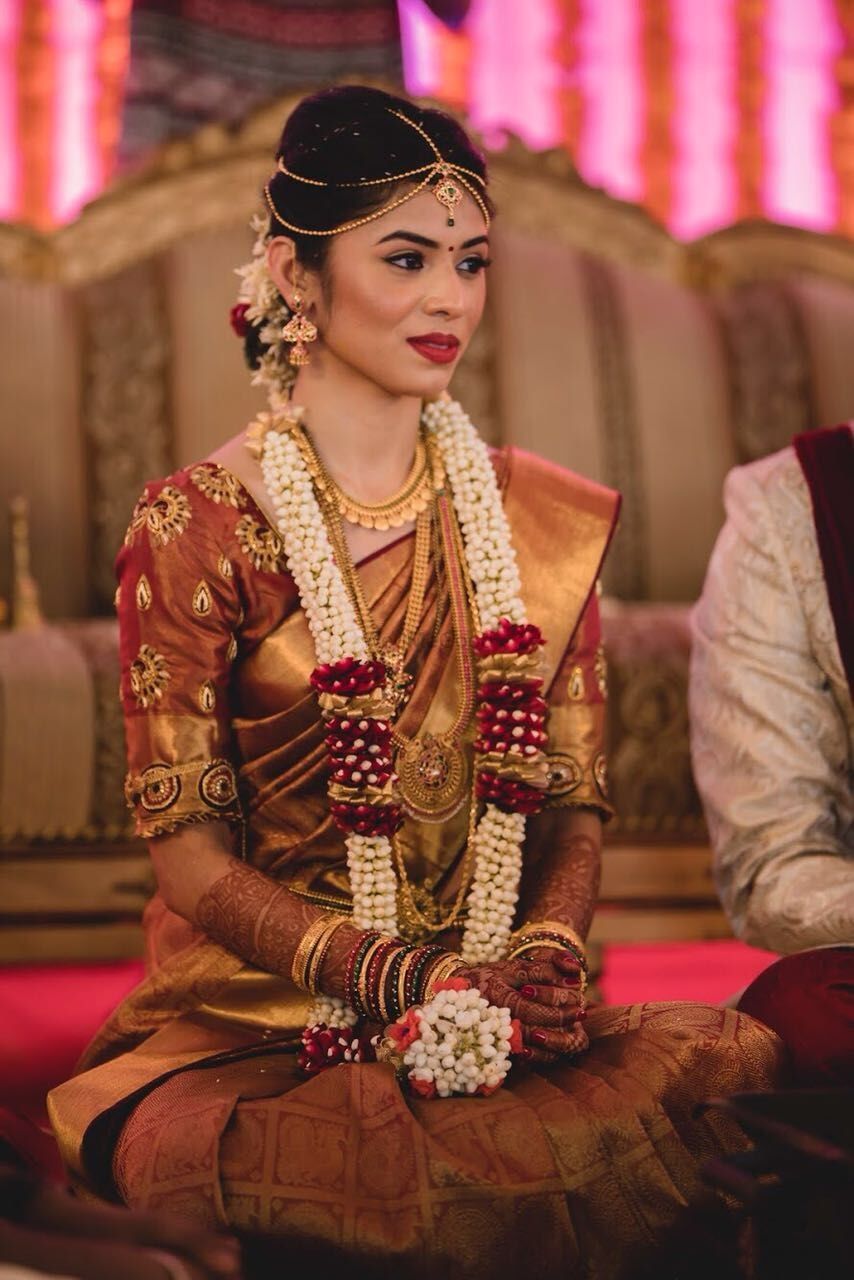 Photo of Dull gold and maroon bridal look for South Indian bride