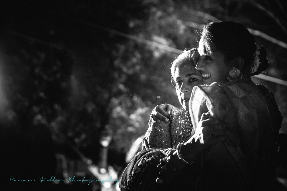 Photo of Black and white portrait of bride and mom