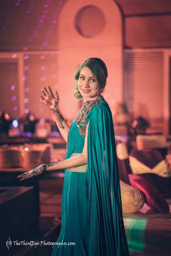 Photo of Teal cape mehendi outfit