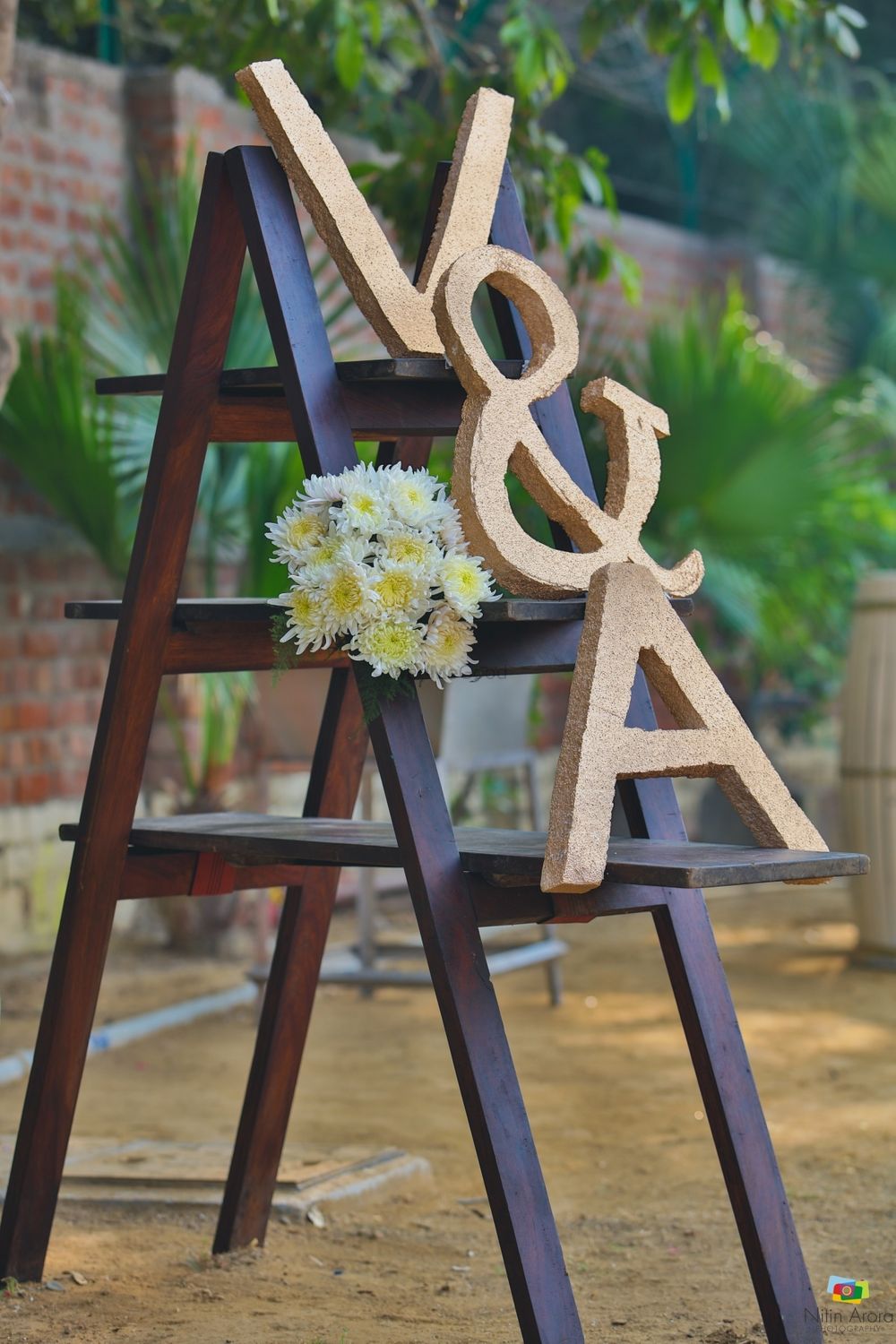Photo of Corner decor idea with ladder and monograms