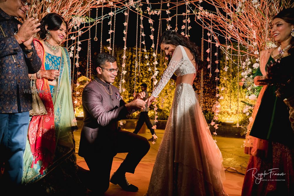 Photo of Couple portrait during ring exchange