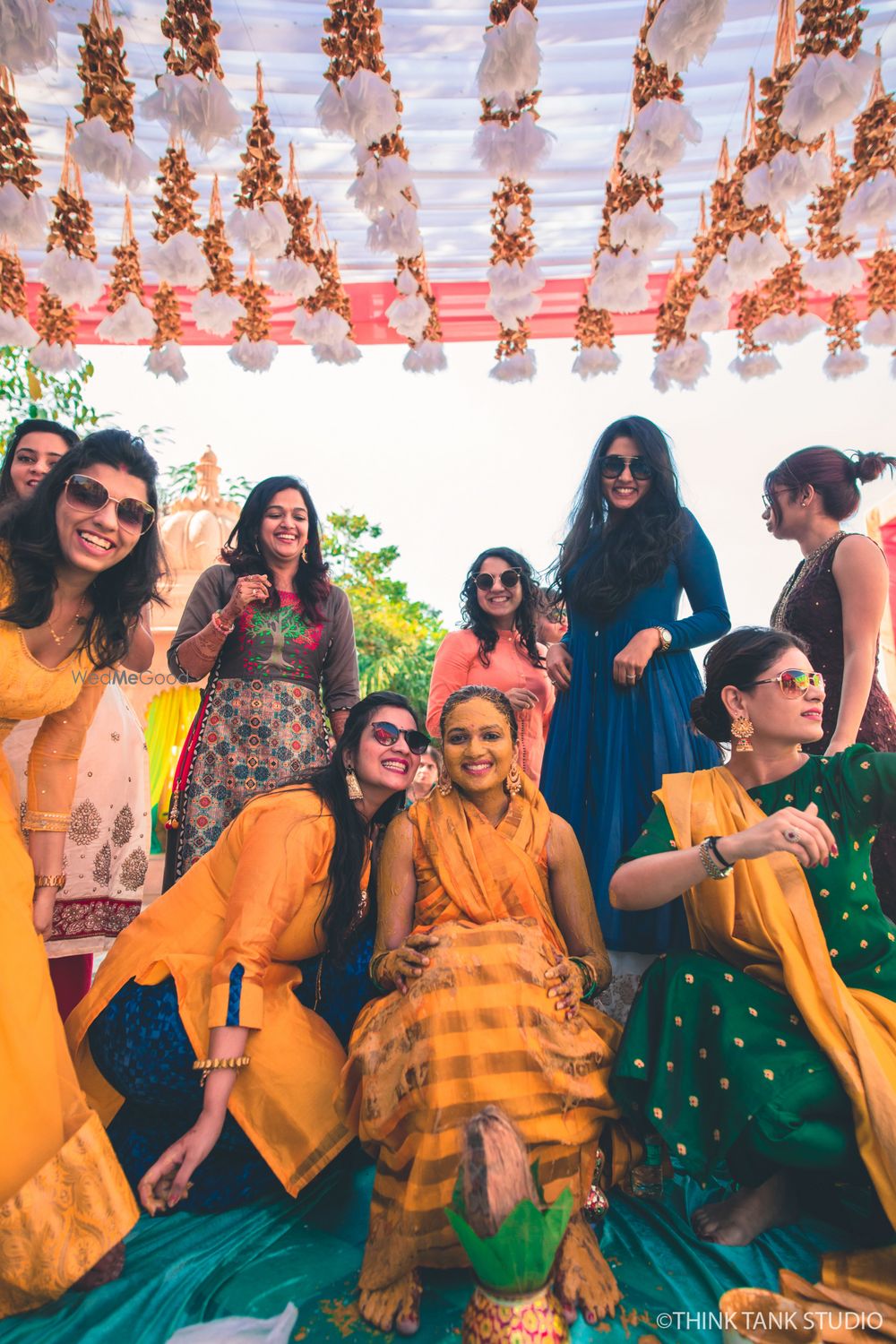 Photo of Haldi photos with everyone wearing yellow