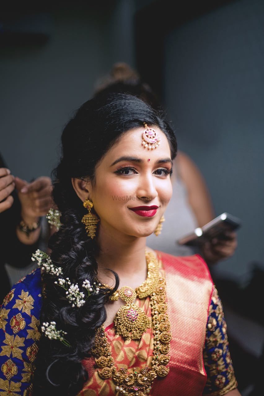 Photo of Pretty south indian bridal portrait while getting ready