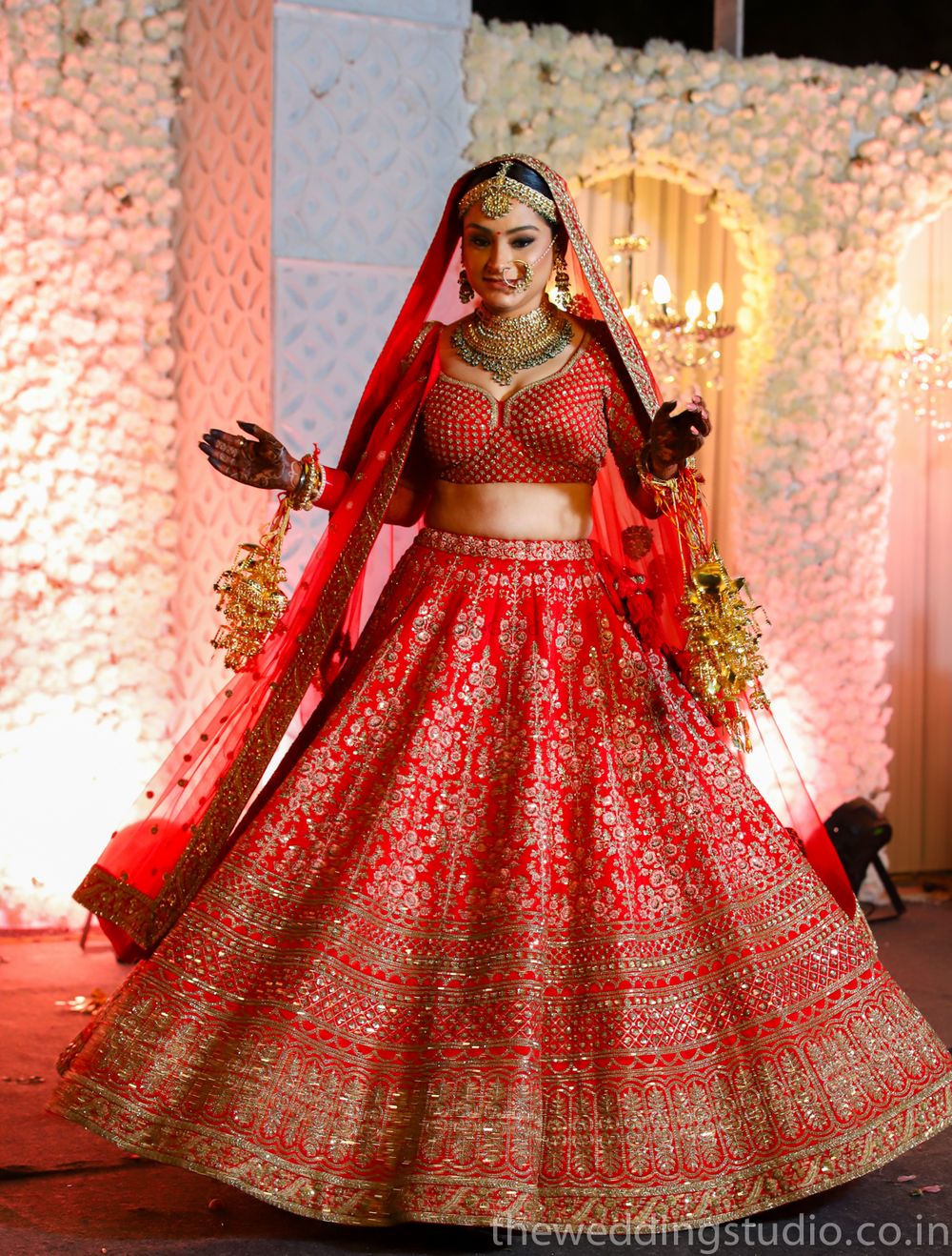 Photo of Red bridal lehenga with choli cut blouse