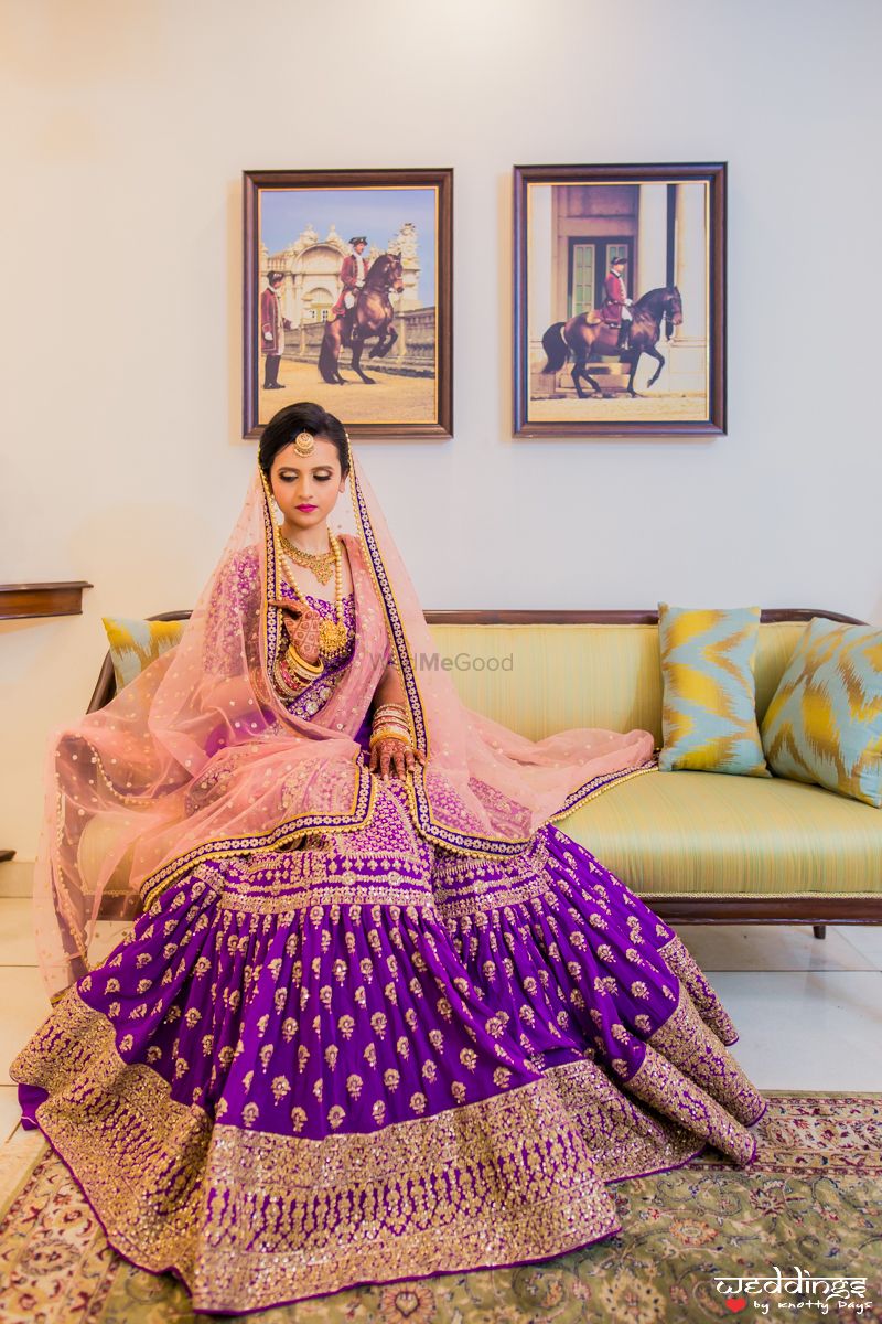Photo of Purple and pink lehenga with gold work