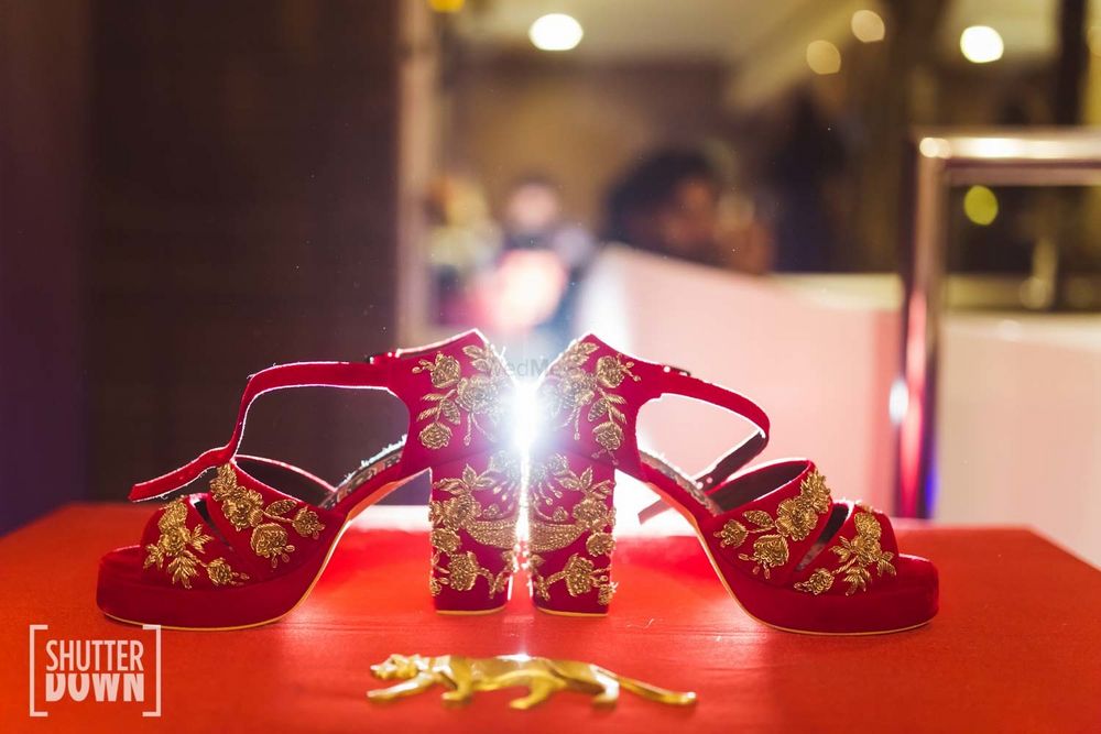 Photo of Zardozi work red and gold bridal shoes