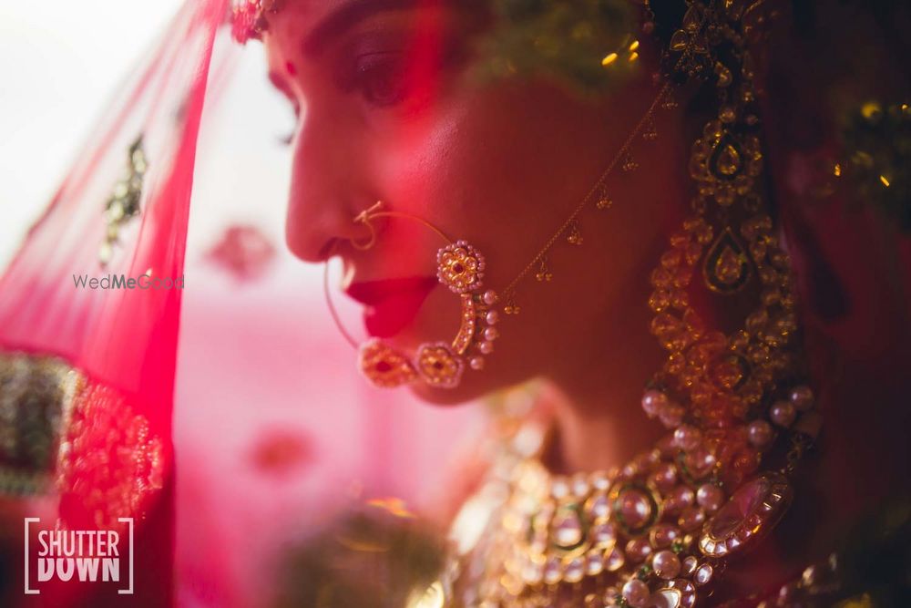 Photo of Bride with veil and nath