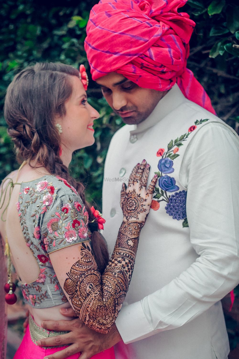 Photo of Mehendi couple shot with embroidered sherwani