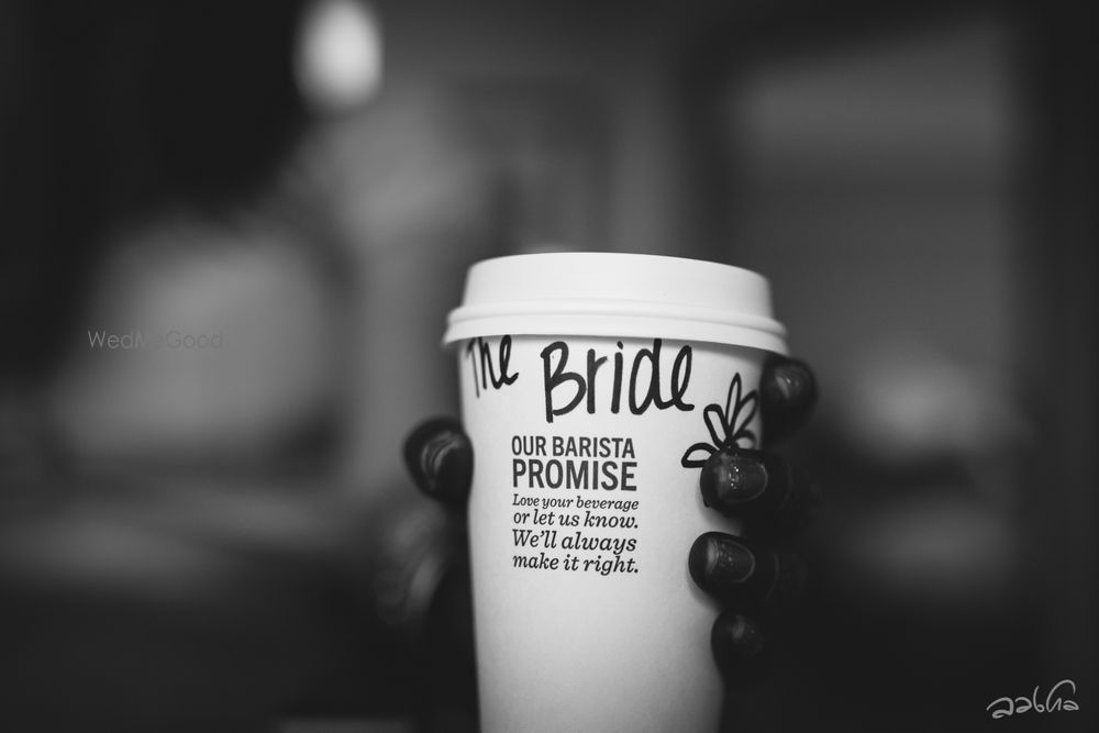 Photo of Cute personalized message on the brides coffee cup on the wedding day