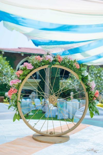 Photo of Unique floral wheel as table centerpieces