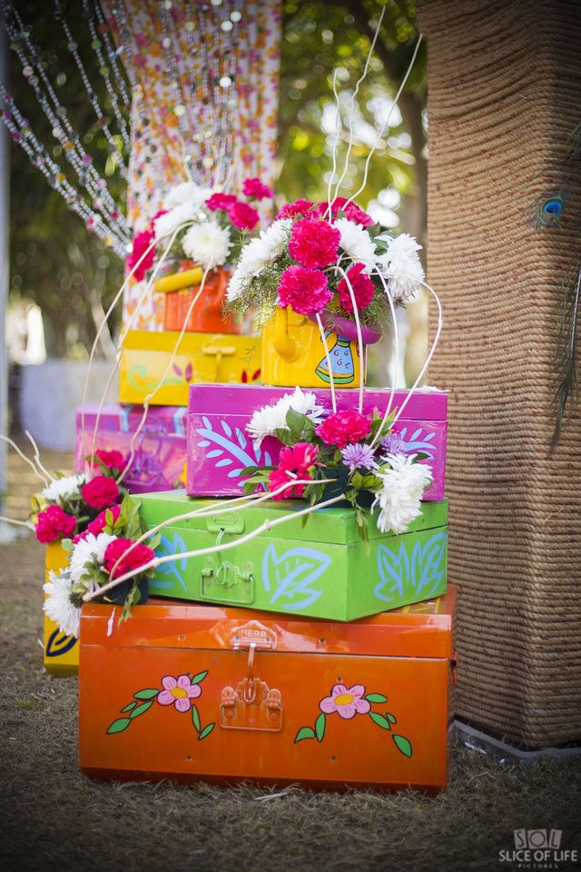 Photo of Colourful decor idea with trunks and florals
