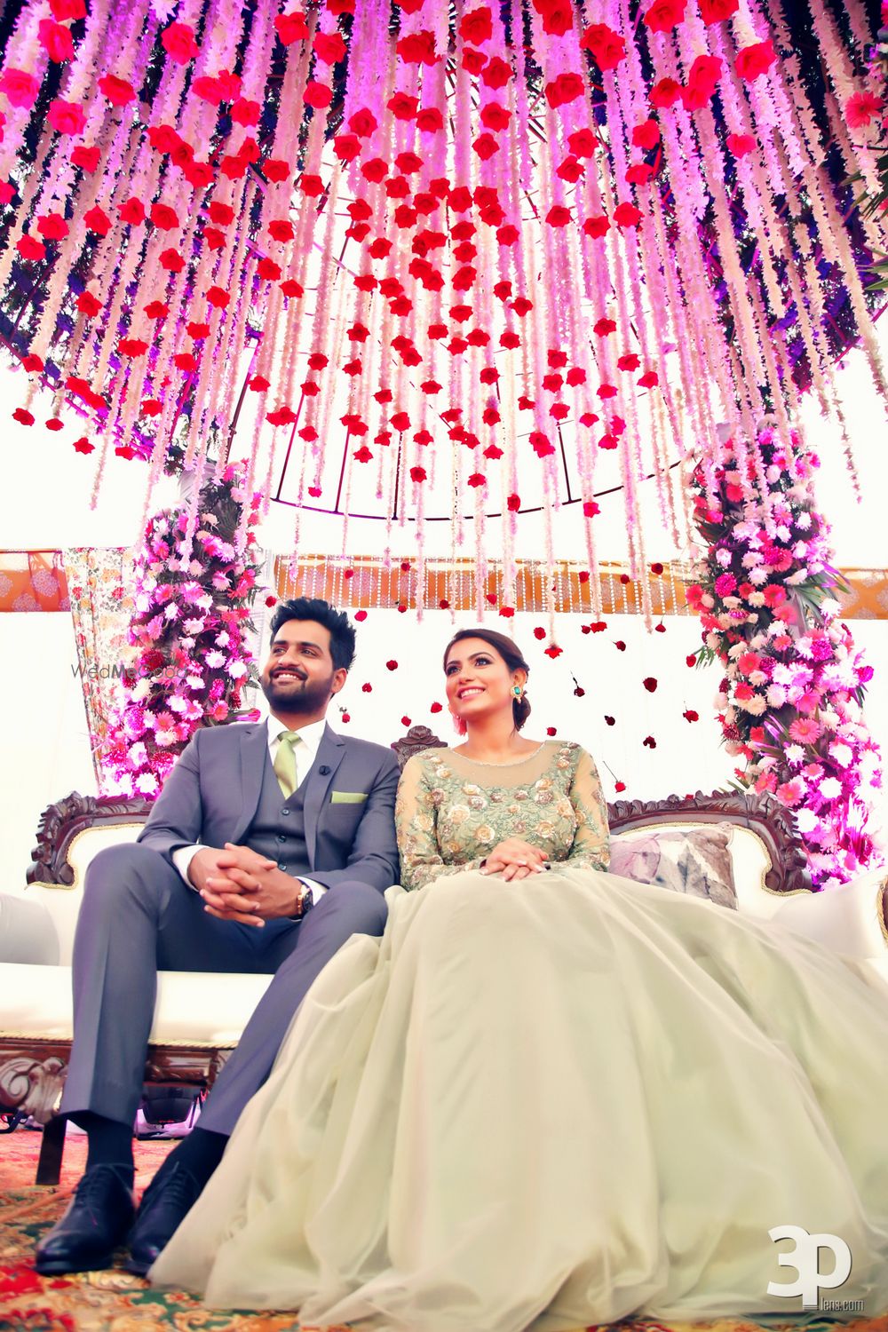 Photo of Engagement decor with hanging floral strings in pink