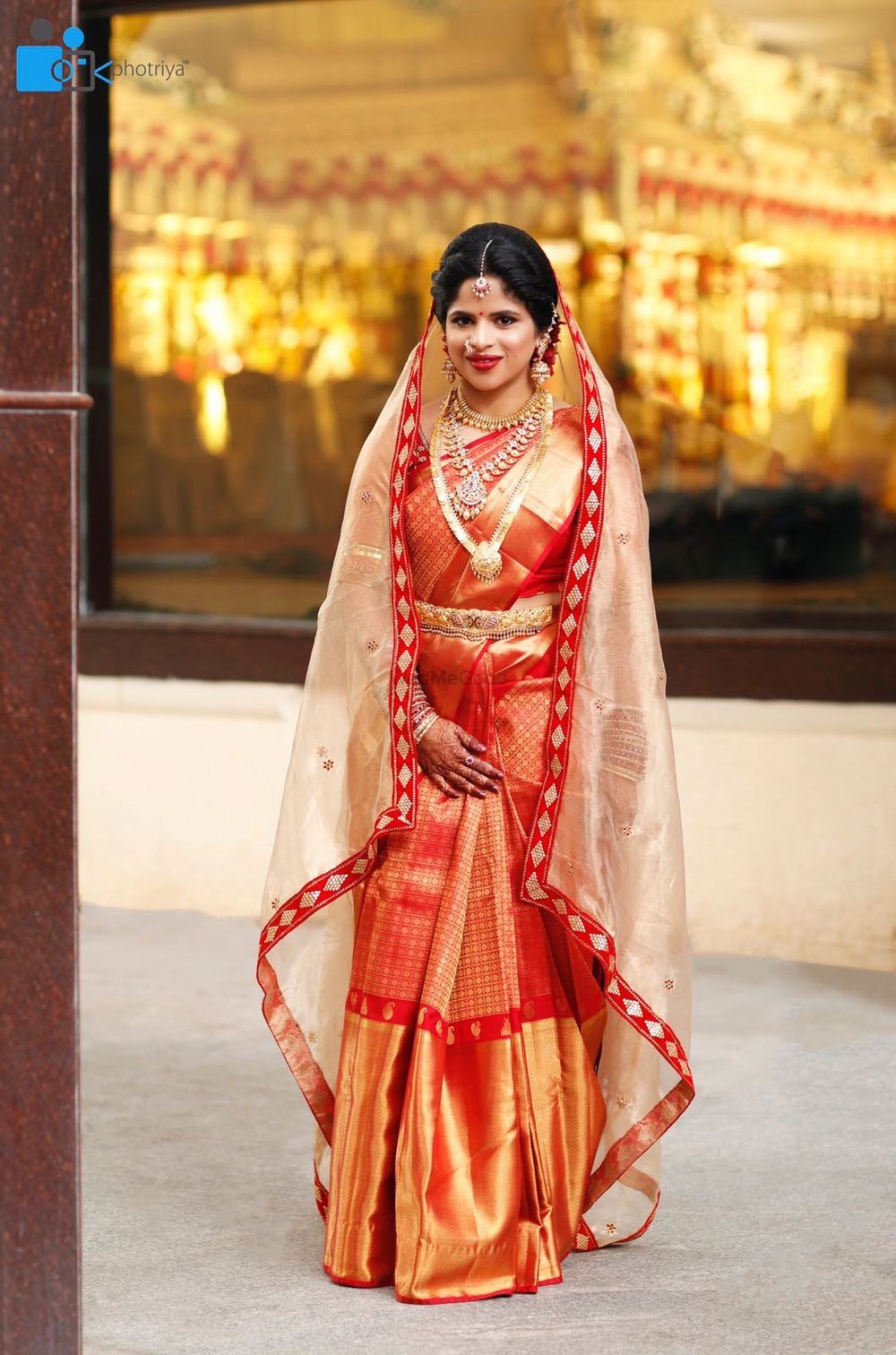 Photo of South Indian bridal look with red and gold kanjivaram and dupatta