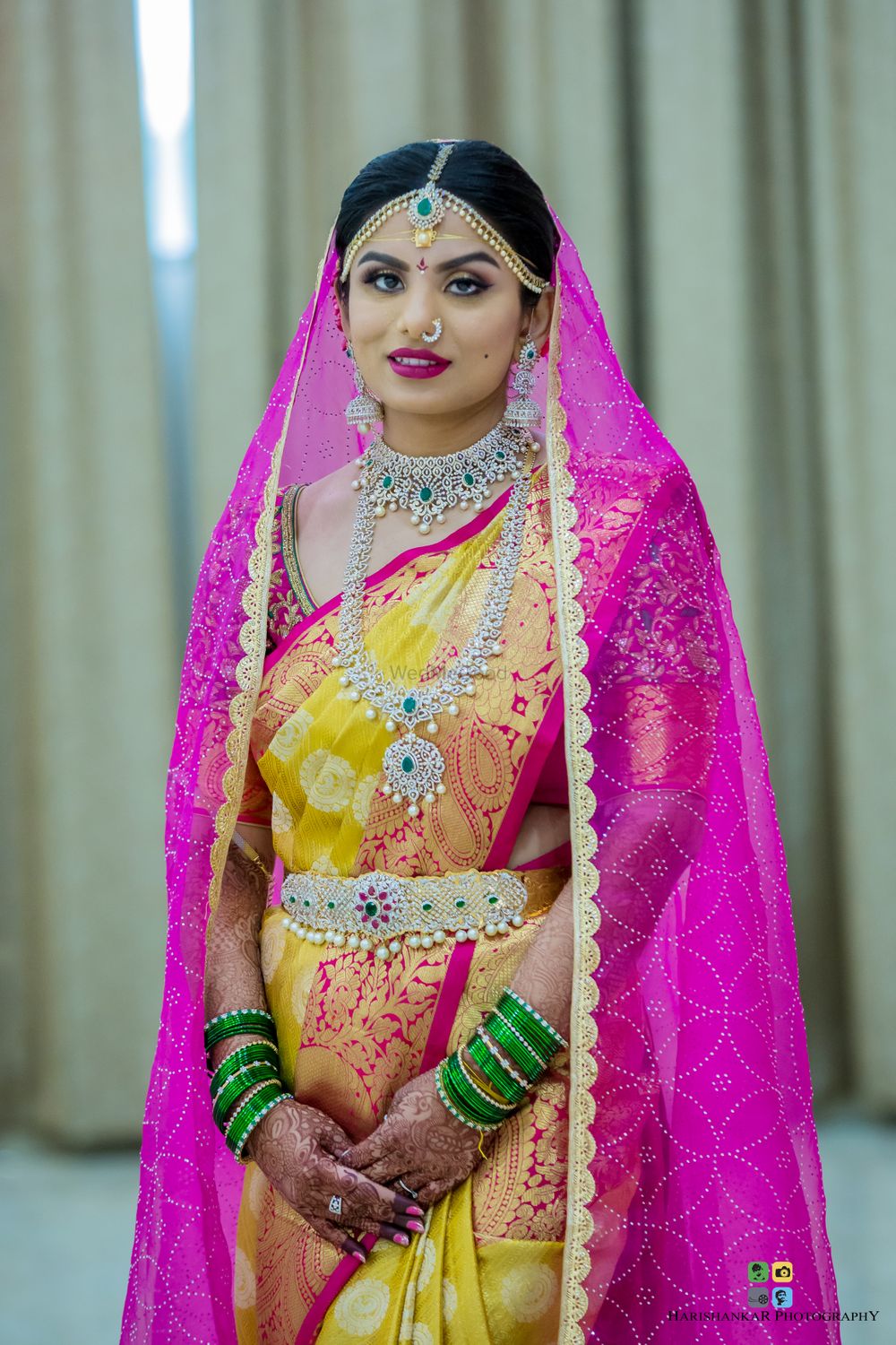 Photo of South Indian bride in yellow saree and diamond jewellery