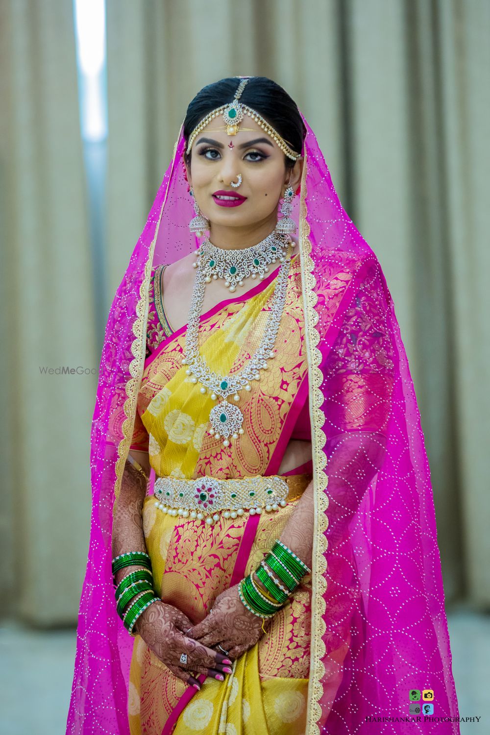 Photo of South Indian bride in yellow saree and diamond jewellery