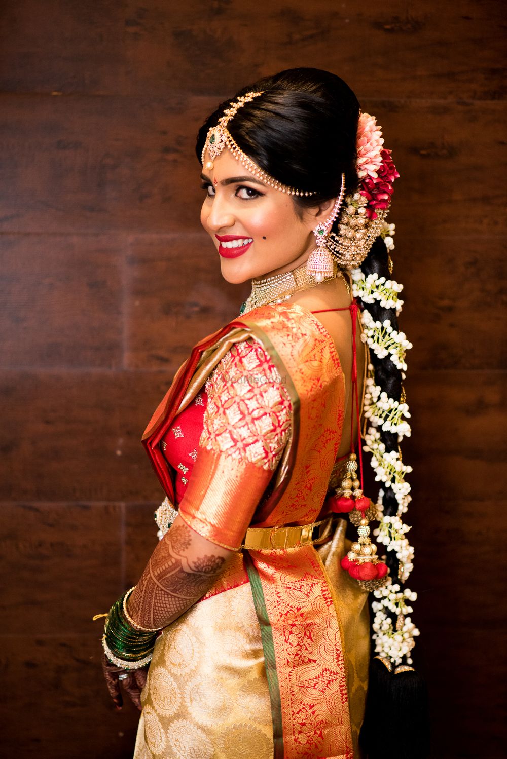 Photo of South Indian bridal braid with flowers