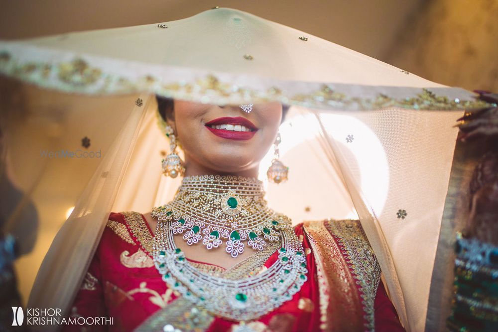 Photo of diamond and emerald choker necklace for south indian bride