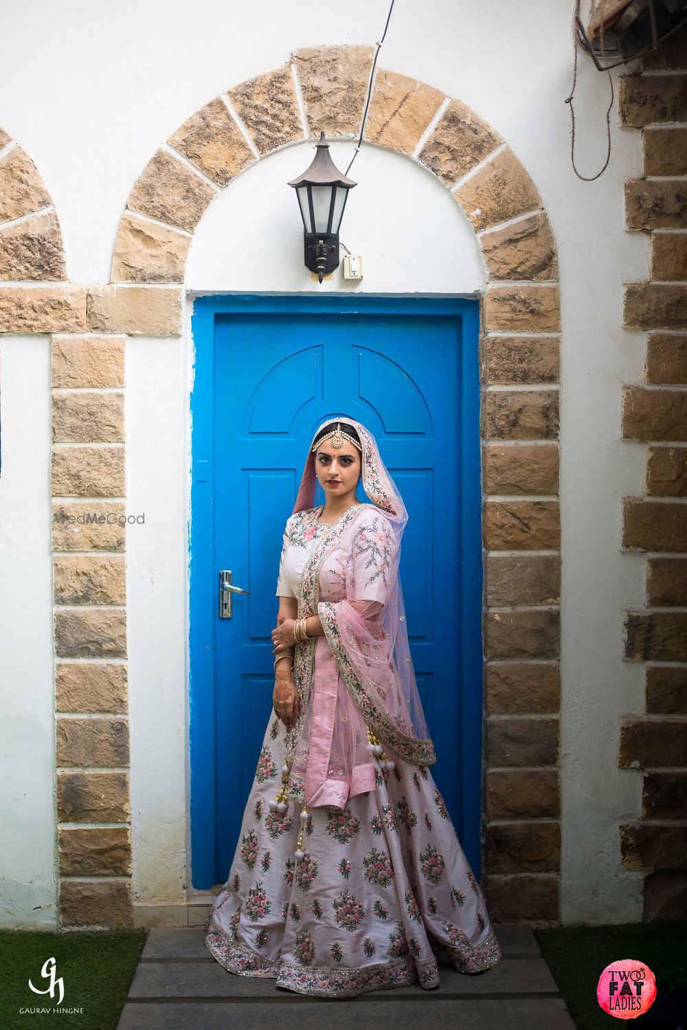 Photo of Light bridal lehenga in white and light pink with floral print