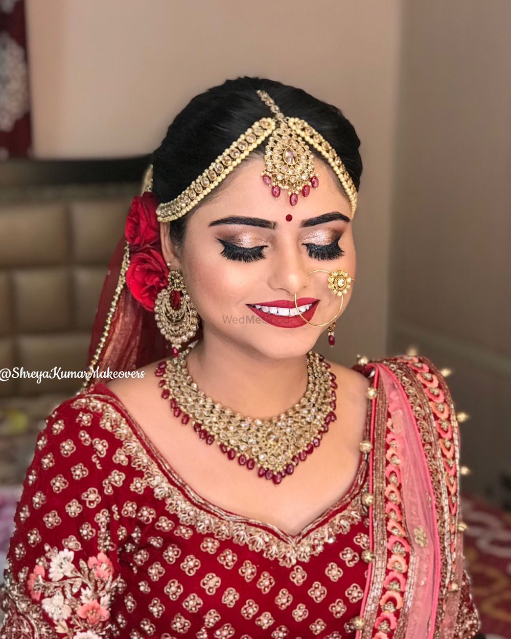 Photo of Red bridal lehenga with beautiful bridal makeup