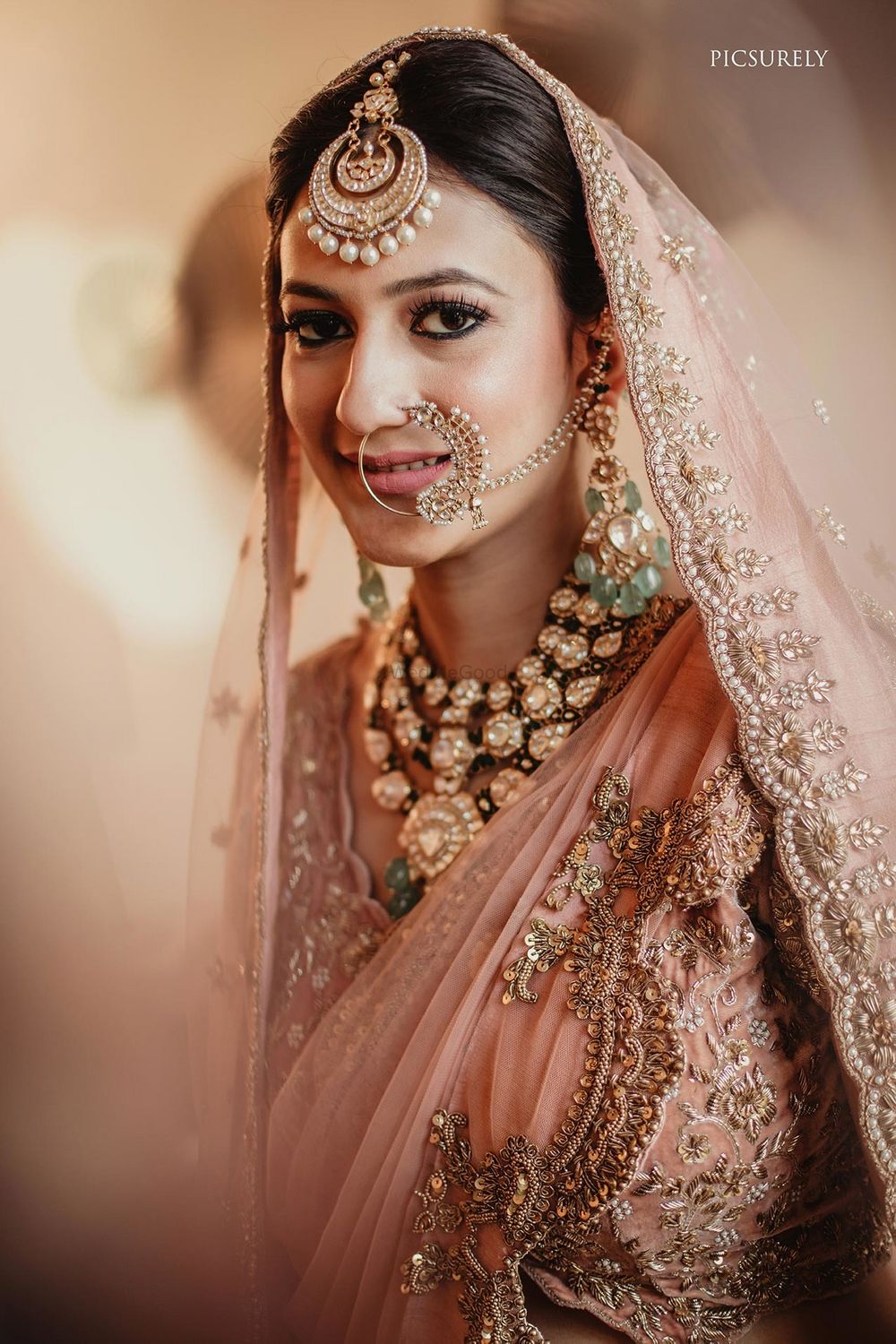 Photo of A bride with unique polki and jadau jewellery