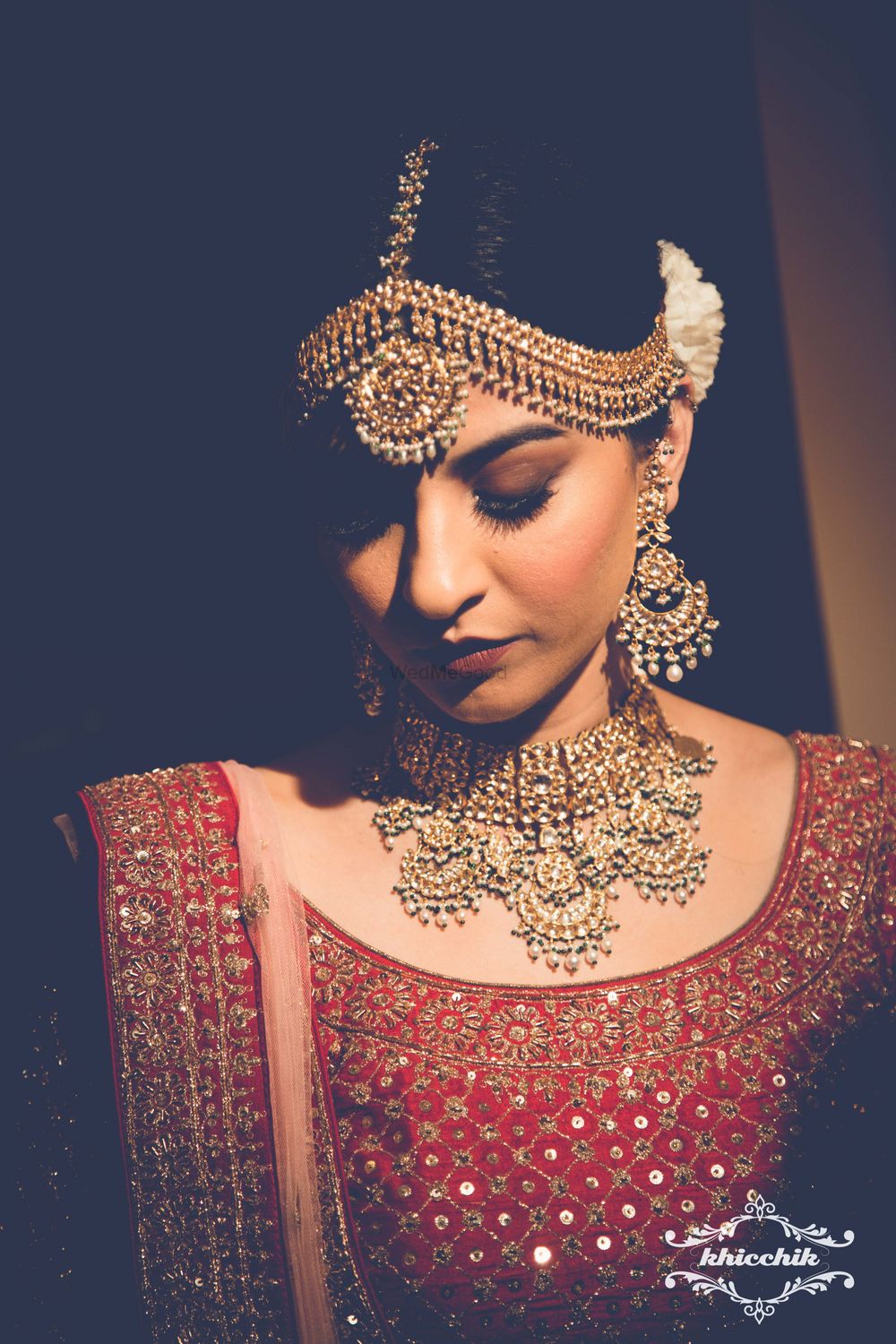 Photo of Bridal jewellery with necklace and matching earrings and mathapatti
